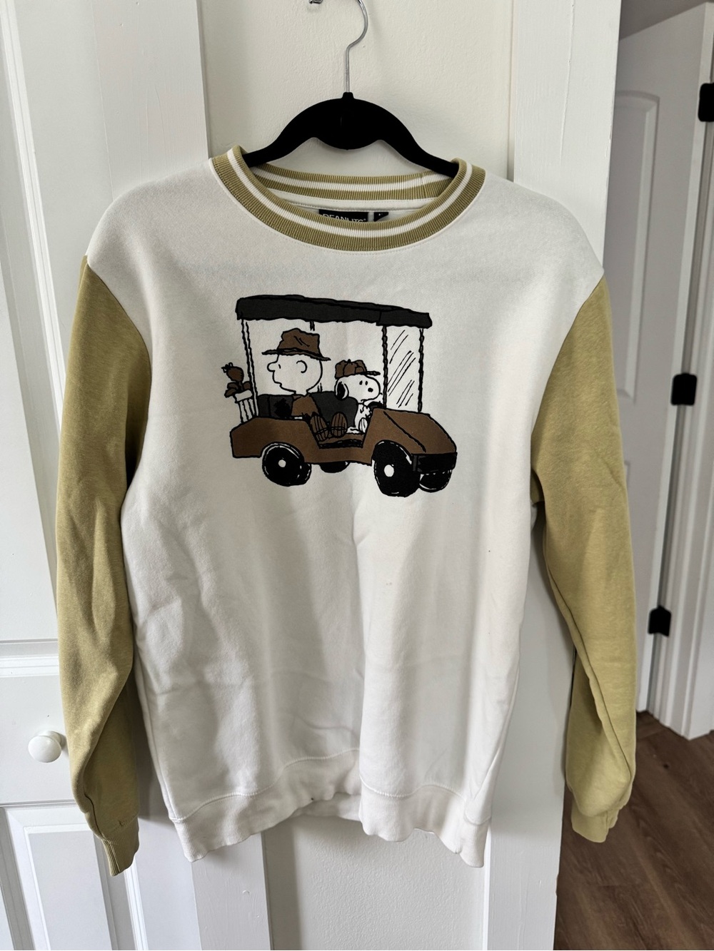 Peanuts White and Olive Crewneck Sweatshirt with Golf Cart Graphic